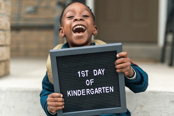 5 Creative First Day of School Photo Ideas You'll Love + FREE Printables