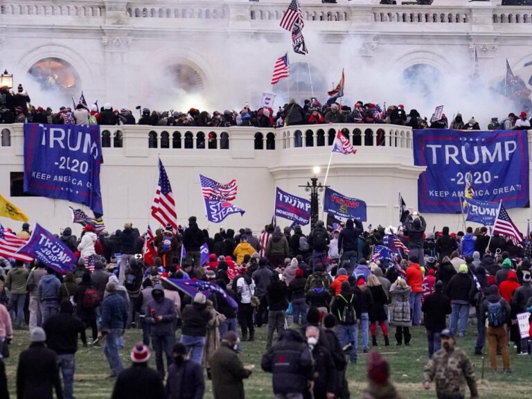 A 72-year-old Capitol rioter who beat a police officer with a Trump flag has obtained an almost 4-year jail sentence