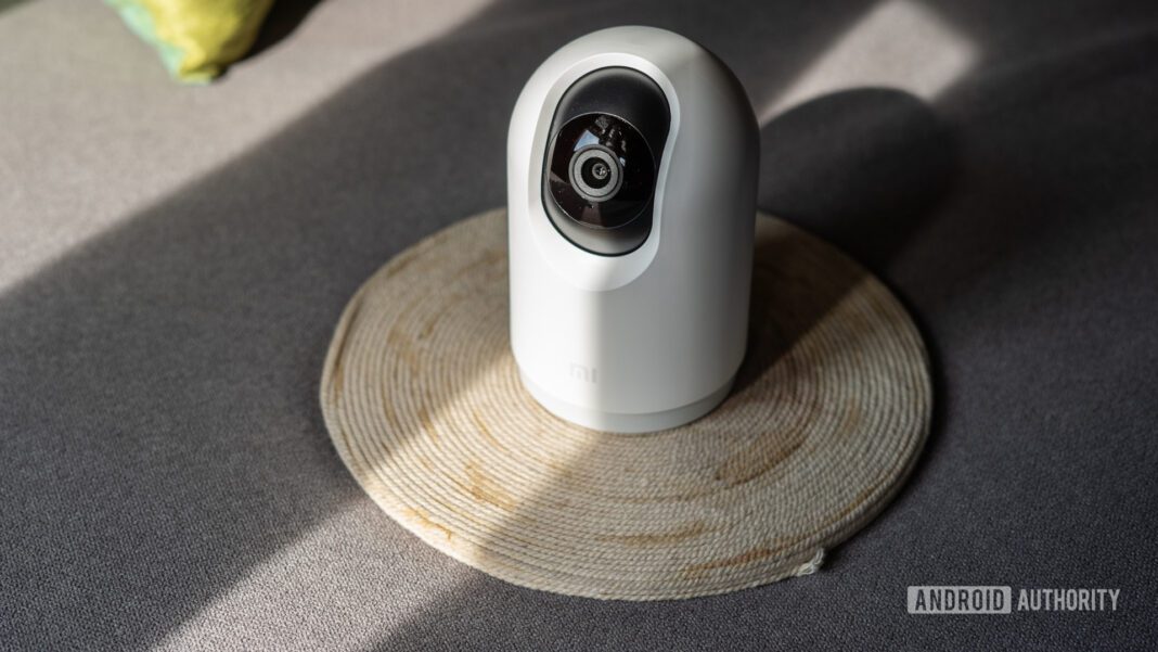 Mi 360 Home Security Camera 2K Pro front showing open lens