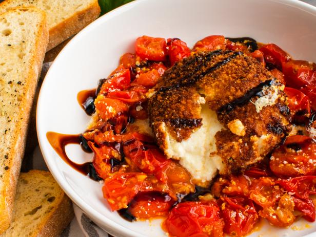 Fried burrata served with cherry tomato sauce, balsamic glaze, and toasted ciabatta