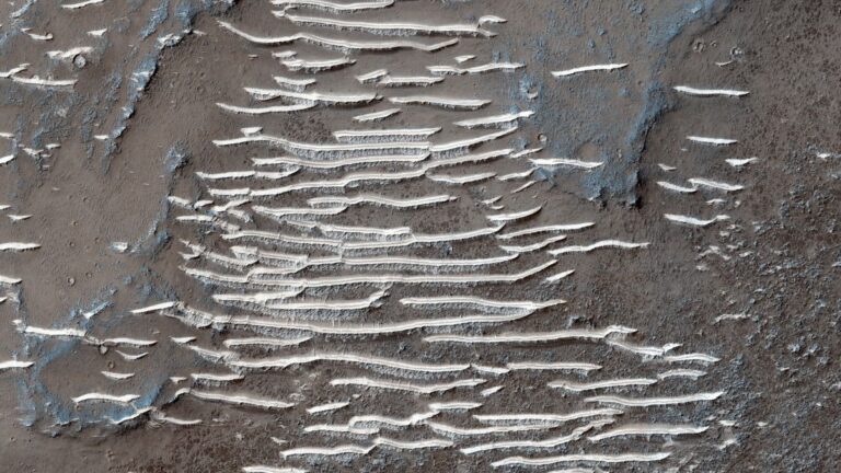 Icy steps on Mars plains may be ancient wind-blown dust