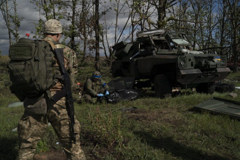 In Ukraine’s retaken battlefields, soldiers recover bodies