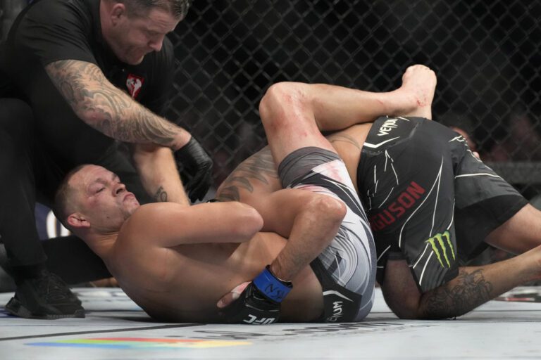 Nate Diaz chokes out Tony Ferguson to finish chaotic UFC 279