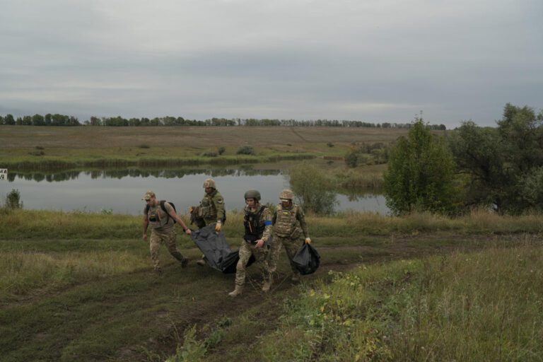 Near the Russian border, bodies still lie on the battlefield