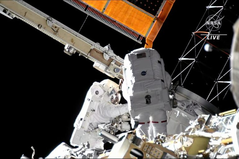 Spacewalking NASA astronauts erect support frame for new solar array