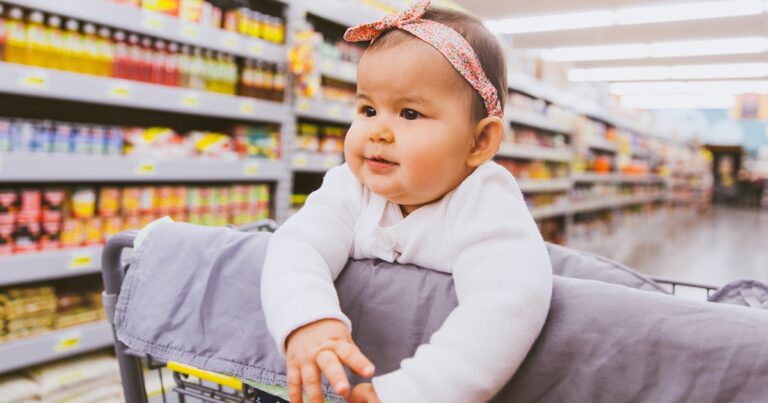 These Shopping Cart Covers Keep Baby Comfy & Clean At The Grocery Store