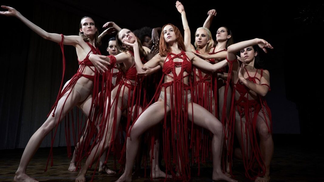 Dancers in bright red costumes in Suspiria - best prime video original movies