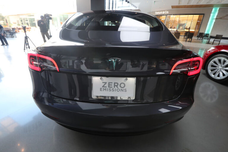 Tesla plans to halve production costs, affordable car a no show By Reuters