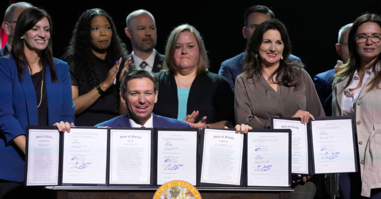 DeSantis Signs Tall Stack of Right-Wing Bills as 2024 Entrance Nears