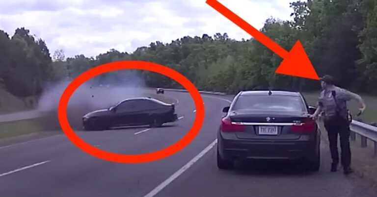 YIKES!!! Car Goes Flying Off The Road, Almost Kills Cop During Traffic Stop