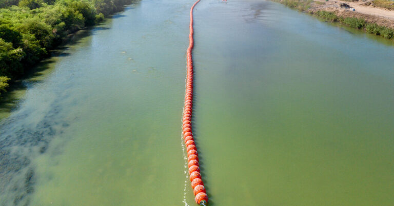 Justice Department Sues Texas Over Floating Barrier in Rio Grande