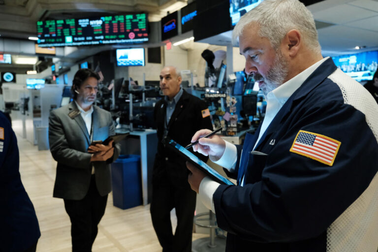 Stocks seesaw, end day and week lower after cool jobs report: Stock market news today