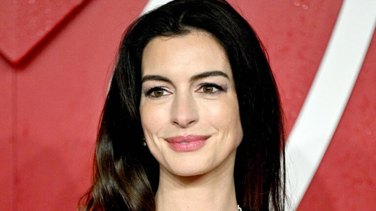 Anne Hathaway Can Check Out Her New Bangs in the Mirror-Like Shine of Her Manicure — See Photos