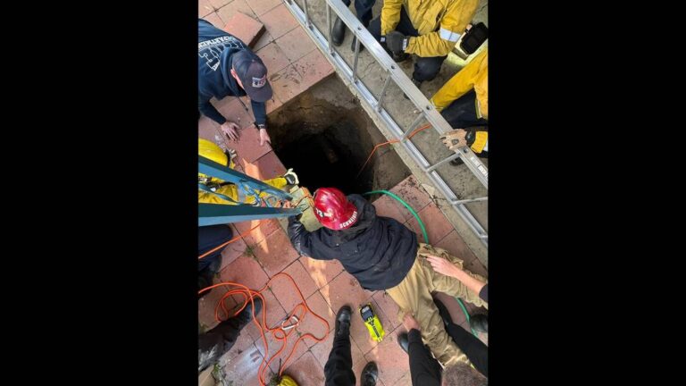 Woman vanishes into 25-foot sinkhole outside home, California rescuers say