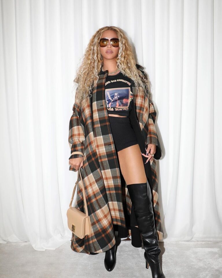 Beyonce Promotes Cowboy Carter in a Chloe Oversized Plaid Cape and A Linda Martell Color Me Country Tee available at Fashion Bomb Daily Shop!