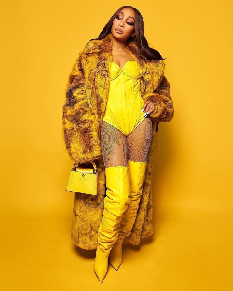 Monica Performed at Nicki Minaj’s Pink Friday 2 World Tour in a Yellow Louis Vuitton SS24 Fur Coat